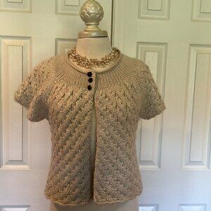 Aphorism L cap sleeve shrug in off white.